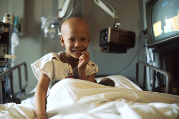 A young girl receiving chemotherapy. Pediatric, childhood, AYA.